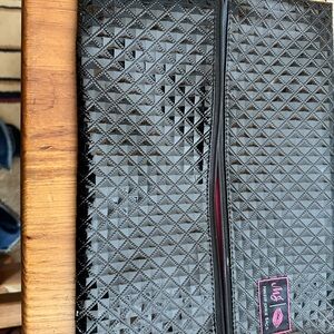 Black Quilted makeup junkie
Cosmetic bag